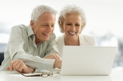 Senior citizens shopping for travel insurance